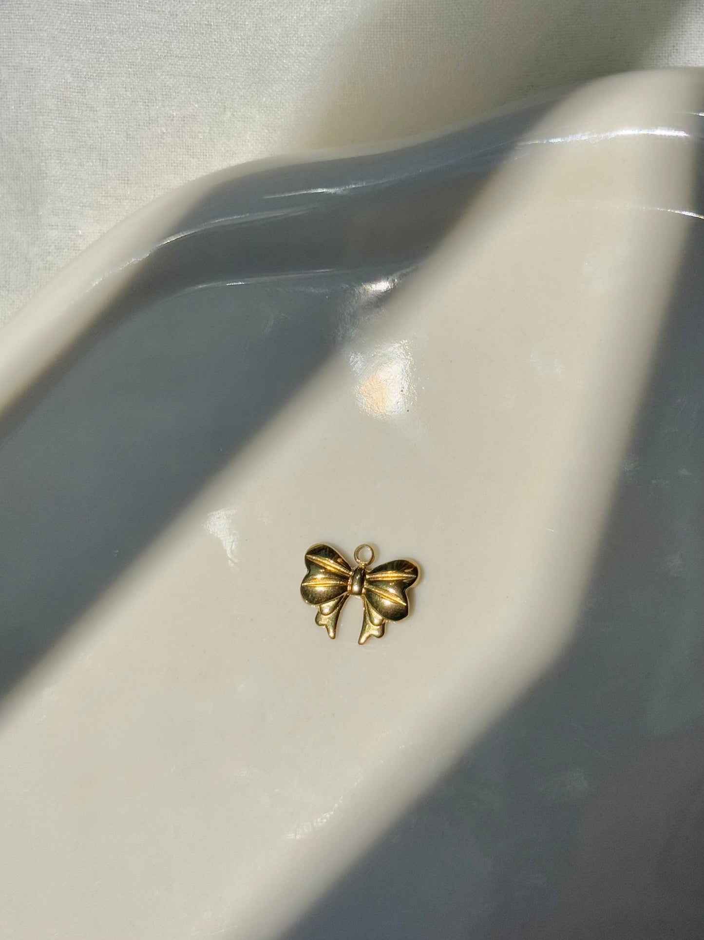 Breloque noeud papillon