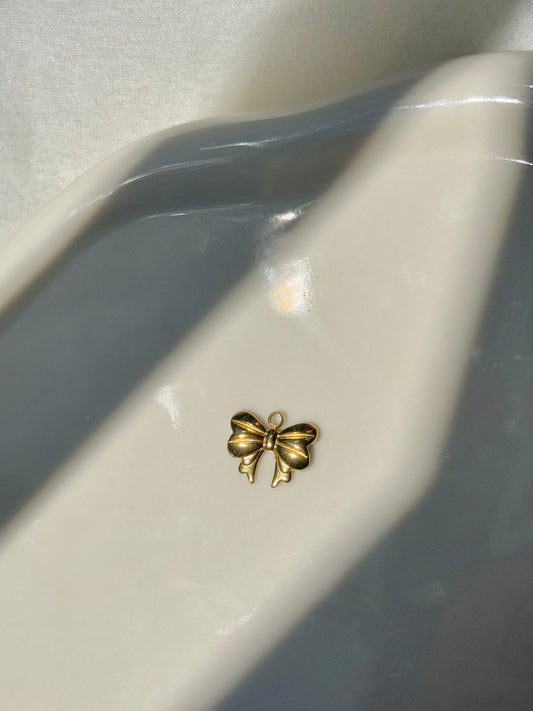 Breloque noeud papillon