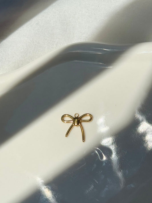 Breloque noeud papillon